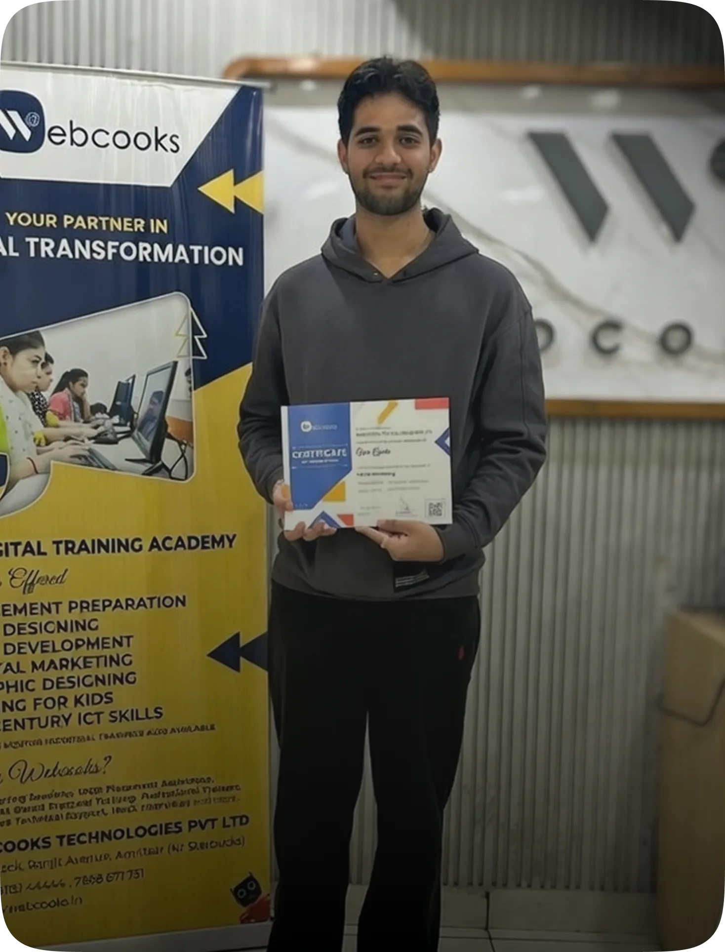 Student with SQL course certificate at Webcooks